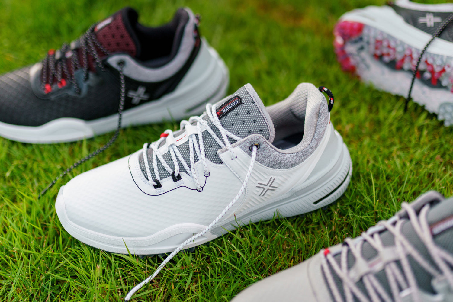 Range of PAYNTR X-001 F Spikeless Golf Shoes on grass