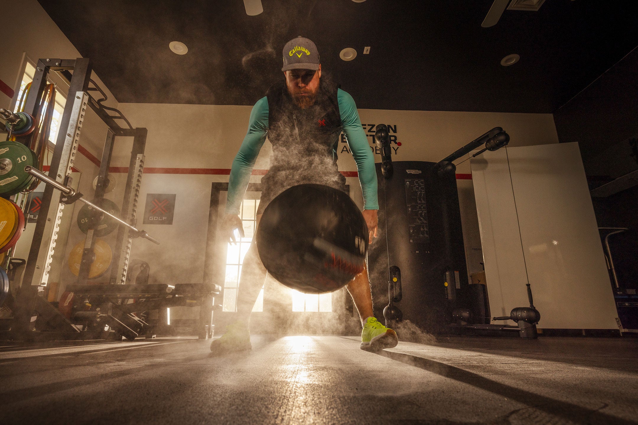 Martin Borgmeier training in a gym wearing PAYNTR Trainer-X