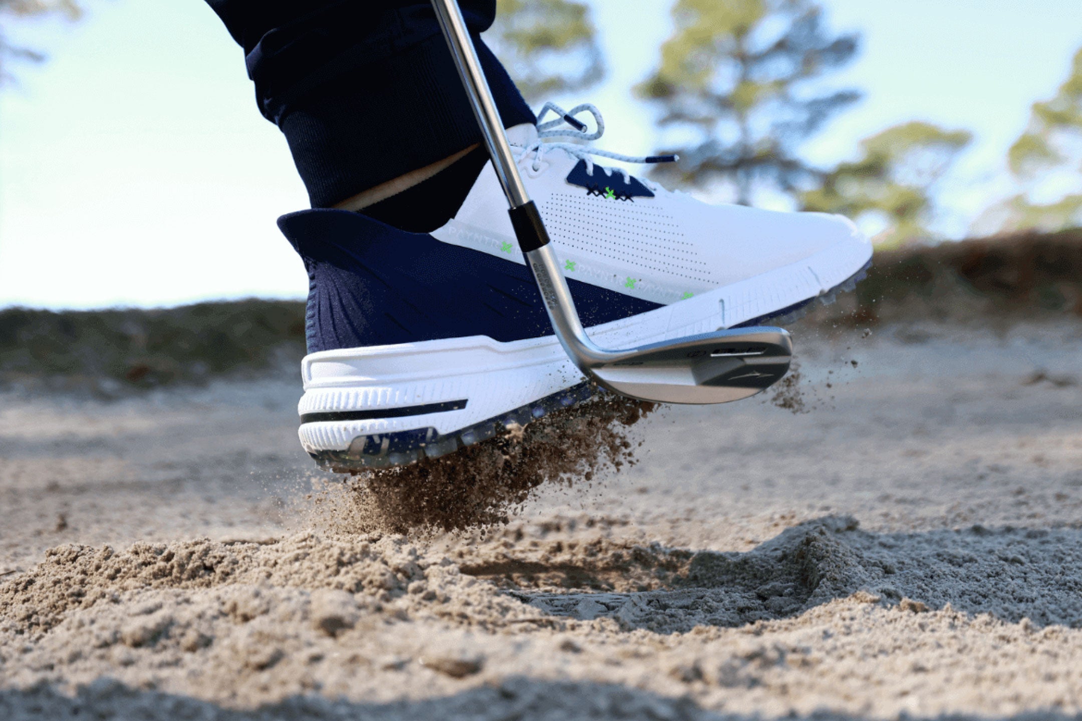 Golfer in bunker wearing the PAYNTR X-005 F Spikeless Golf Shoes